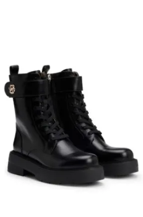 Botas de piel con cordones y monograma Double B