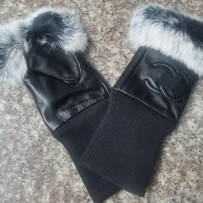 Guantes de diseñador para mujer Nueva calidad Guantes de lujo de cuero de invierno para mujer de gama alta Pantalla táctil de fe