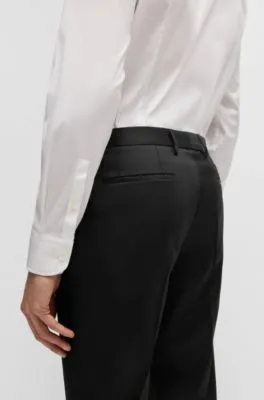 Pantalones de traje extra slim fit en sarga de lana virgen