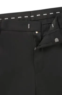 Pantalones de traje extra slim fit en sarga de lana virgen